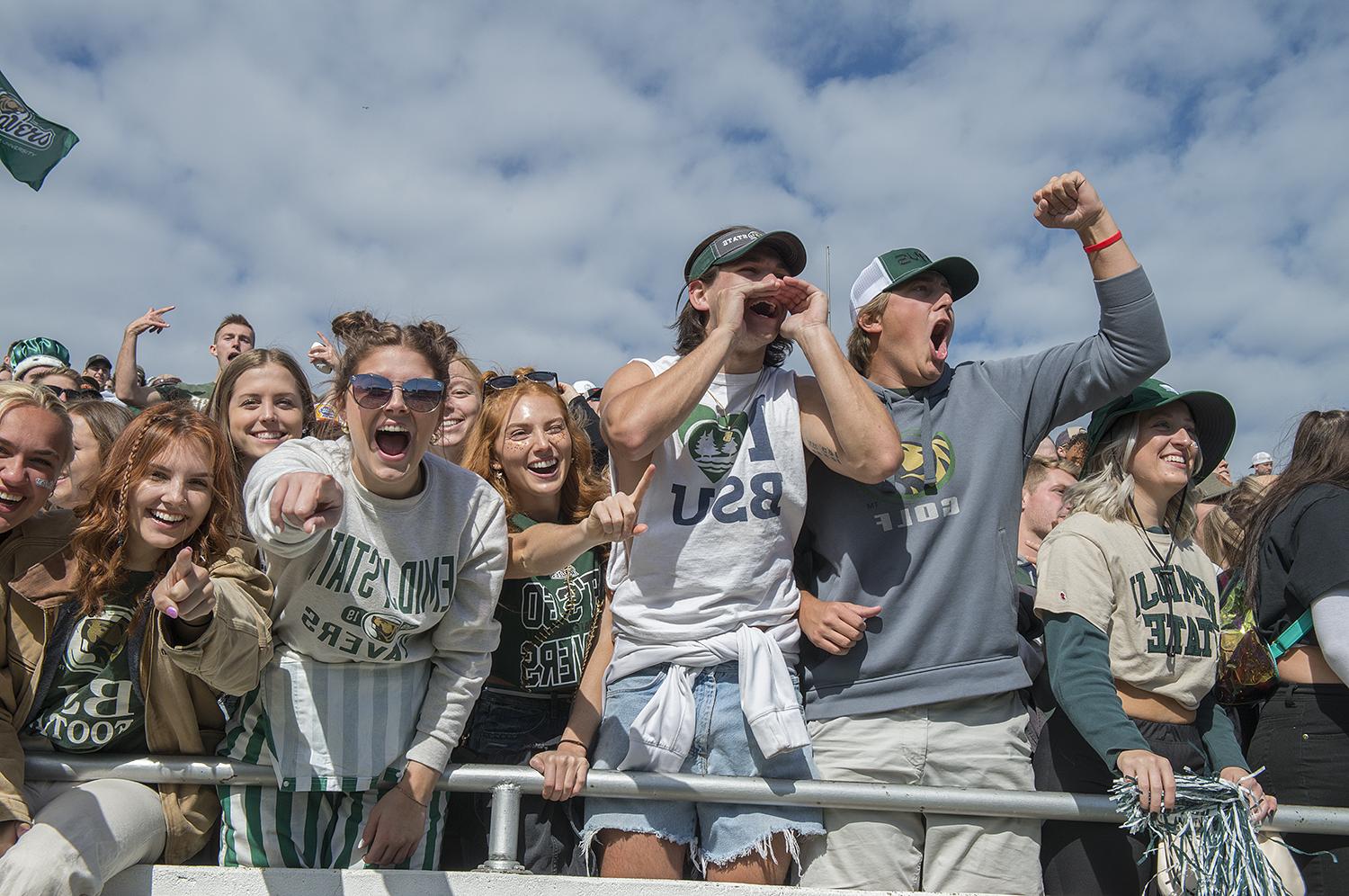 Bemidji State University students cheering in the stands during the 2023 homecoming game
